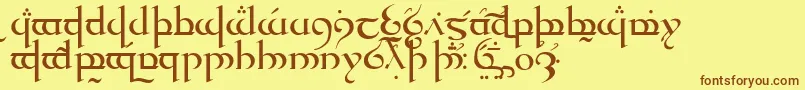 フォントTengwarQuenyaMedium – 茶色の文字が黄色の背景にあります。