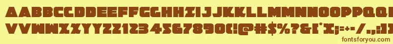 フォントJedisf – 茶色の文字が黄色の背景にあります。