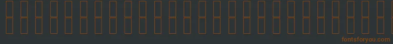 Czcionka SkrHead2Italic – brązowe czcionki na czarnym tle