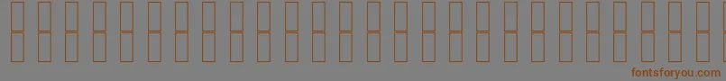 Шрифт SkrHead2Italic – коричневые шрифты на сером фоне