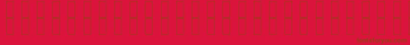 SkrHead2Italic-Schriftart – Braune Schriften auf rotem Hintergrund