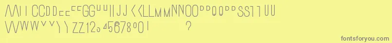 Ostrichsansstack2-fontti – harmaat kirjasimet keltaisella taustalla