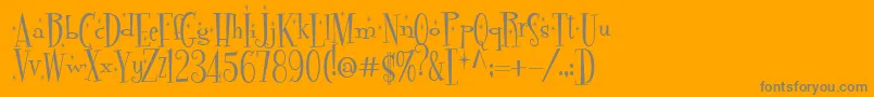 Pudelinka-Schriftart – Graue Schriften auf orangefarbenem Hintergrund