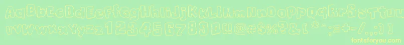 ChristmasCookies Font – Yellow Fonts on Green Background