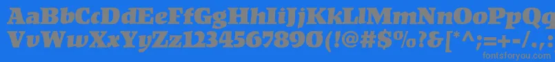 フォントKompaktltstd – 青い背景に灰色の文字