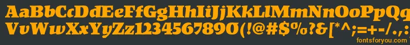 フォントKompaktltstd – 黒い背景にオレンジの文字