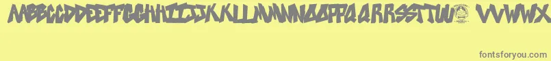SweetAsRevenge-Schriftart – Graue Schriften auf gelbem Hintergrund