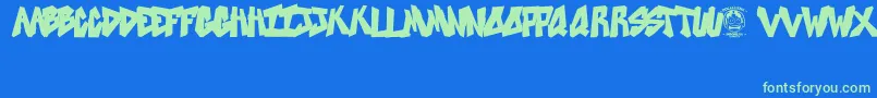 SweetAsRevenge Font – Green Fonts on Blue Background