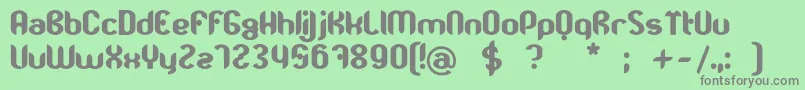 TjkmoostGras Font – Gray Fonts on Green Background