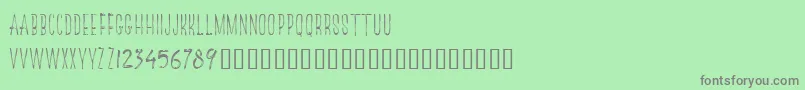 フォントTheRedlightLineFree – 緑の背景に灰色の文字