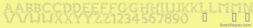 FizzoRegular Font – Gray Fonts on Yellow Background