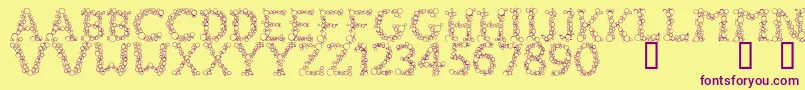 FizzoRegular Font – Purple Fonts on Yellow Background