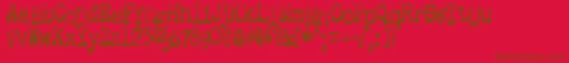 Fonte Gutter – fontes marrons em um fundo vermelho