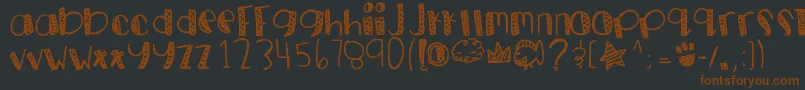 Goldpanda-fontti – ruskeat fontit mustalla taustalla