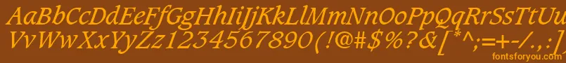 フォントGrammateusSsiItalic – オレンジ色の文字が茶色の背景にあります。