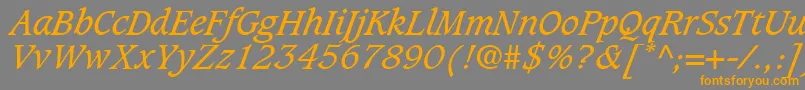 フォントGrammateusSsiItalic – オレンジの文字は灰色の背景にあります。