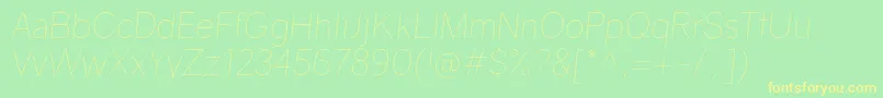 GravityUltralightitalic-Schriftart – Gelbe Schriften auf grünem Hintergrund