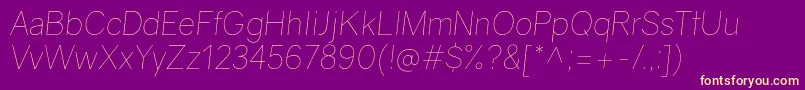 Fonte GravityUltralightitalic – fontes amarelas em um fundo roxo