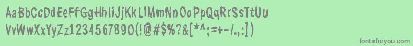 フォントKasuaariKirjastossa – 緑の背景に灰色の文字