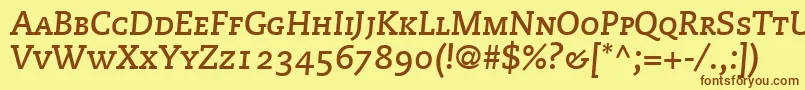 フォントMonologueCapsSsiBoldItalicSmallCaps – 茶色の文字が黄色の背景にあります。