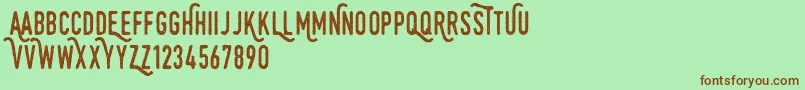 Monthoers-fontti – ruskeat fontit vihreällä taustalla