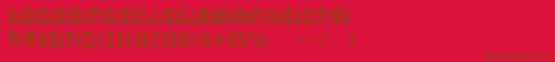 DecreeNarrow-Schriftart – Braune Schriften auf rotem Hintergrund
