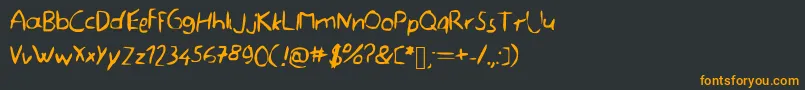 フォントMemefont – 黒い背景にオレンジの文字