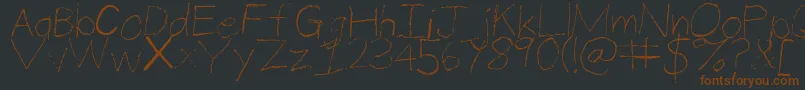 Czcionka ThinPencilHandwriting – brązowe czcionki na czarnym tle