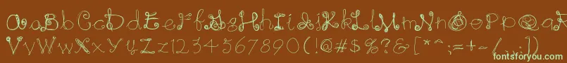 フォントRaininginwhite – 緑色の文字が茶色の背景にあります。