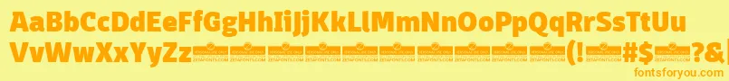 フォントDomotikaHeavyTrial – オレンジの文字が黄色の背景にあります。