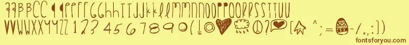 フォントHappyeaster – 茶色の文字が黄色の背景にあります。