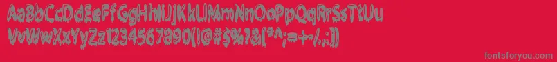 Fonte Gloop – fontes cinzas em um fundo vermelho