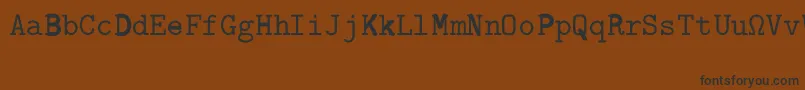 Шрифт CmTypewriterRegular – чёрные шрифты на коричневом фоне