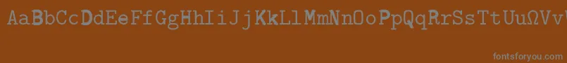 Más sobre la fuente CmTypewriterRegular fuente CmTypewriterRegular – Fuentes Grises Sobre Fondo Marrón