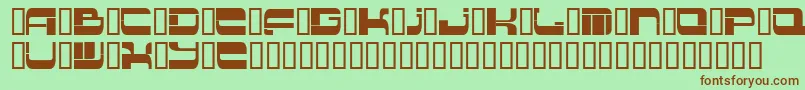 Insert 2-fontti – ruskeat fontit vihreällä taustalla