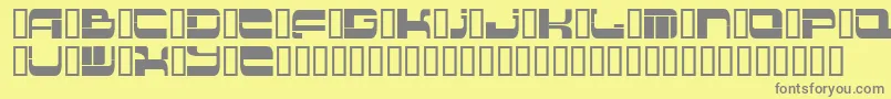 Insert 2-fontti – harmaat kirjasimet keltaisella taustalla