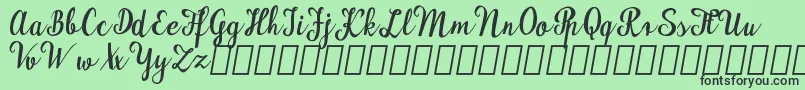 MaudlynDemo Font – Black Fonts on Green Background