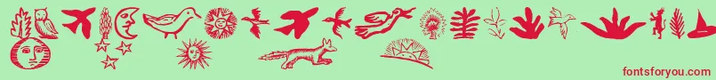 Czcionka ChapbookDingbats – czerwone czcionki na zielonym tle