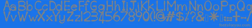 Sempoi-fontti – harmaat kirjasimet sinisellä taustalla