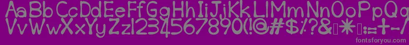 Sempoi-fontti – harmaat kirjasimet violetilla taustalla