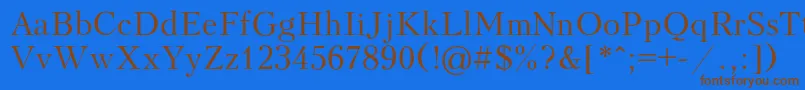 フォントKudriashovRegular – 茶色の文字が青い背景にあります。