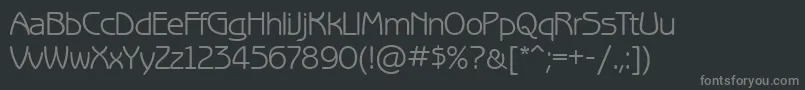 Benguiatgothicett-fontti – harmaat kirjasimet mustalla taustalla