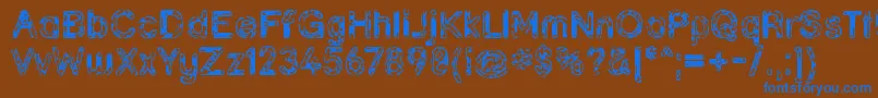 Grunja ffy Font – Blue Fonts on Brown Background