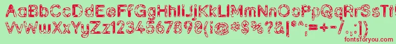 Grunja ffy-Schriftart – Rote Schriften auf grünem Hintergrund