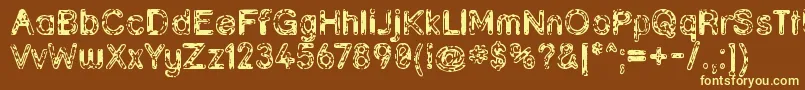 Grunja ffy-fontti – keltaiset fontit ruskealla taustalla