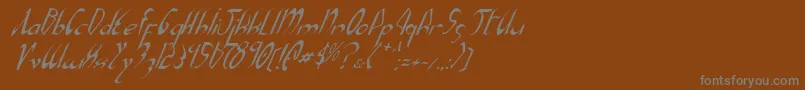 Xaphani-Schriftart – Graue Schriften auf braunem Hintergrund