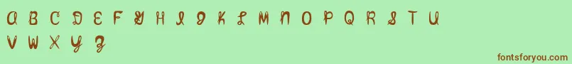 Amixmutt Font – Brown Fonts on Green Background