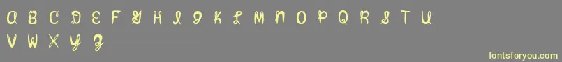 Amixmutt Font – Yellow Fonts on Gray Background