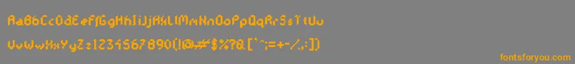 フォントGalacticasExtrabold – オレンジの文字は灰色の背景にあります。