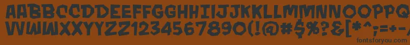 MondobeyondoBbBold Font – Black Fonts on Brown Background